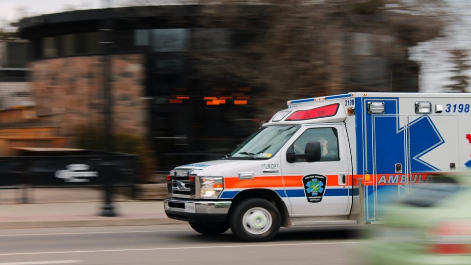white-blue-orange-ambulance